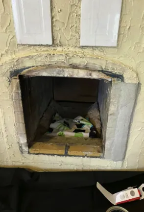 Damaged arched firebox before insert install