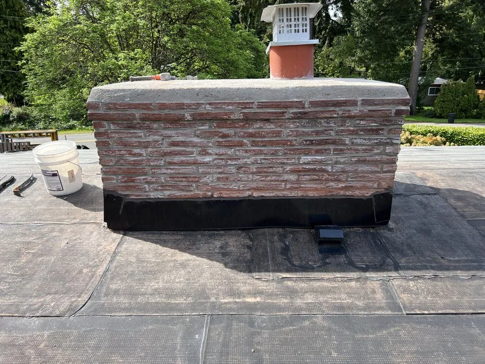 Freshly applied crown coat sealing chimney top